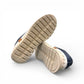 ROAMERS PARIS leather sneakers in navy and white with a unique chunky rubber sawtooth outsole.
photo of the bottom side