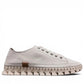 Roamers Paris white leather sneaker with a unique textured rubber outsole and lace-up design.
photo of the right side