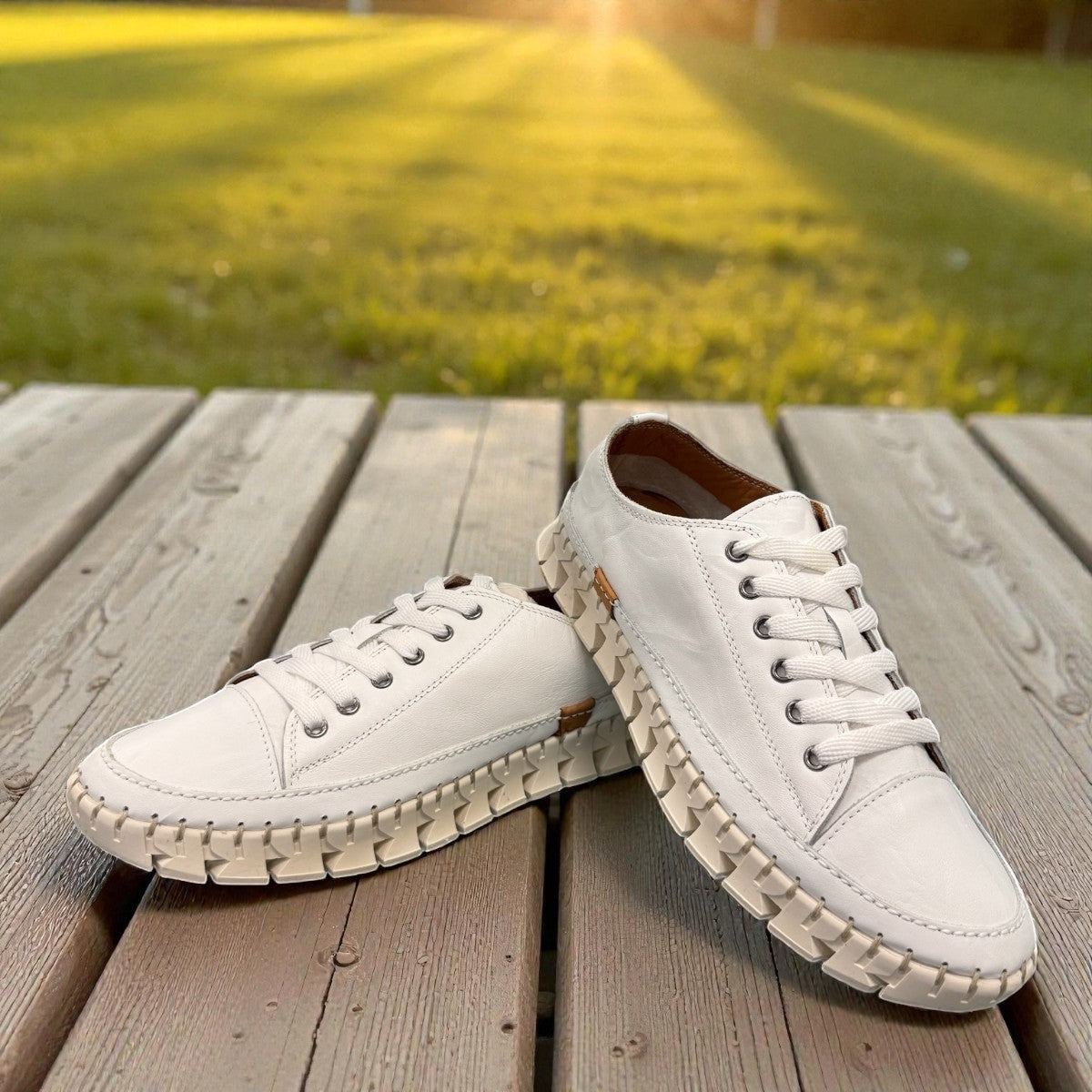 Roamers Paris white leather sneaker with a unique textured rubber outsole and lace-up design.
photo of the front side