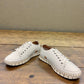 Roamers Paris white leather sneaker with a unique textured rubber outsole and lace-up design.
photo of the front side