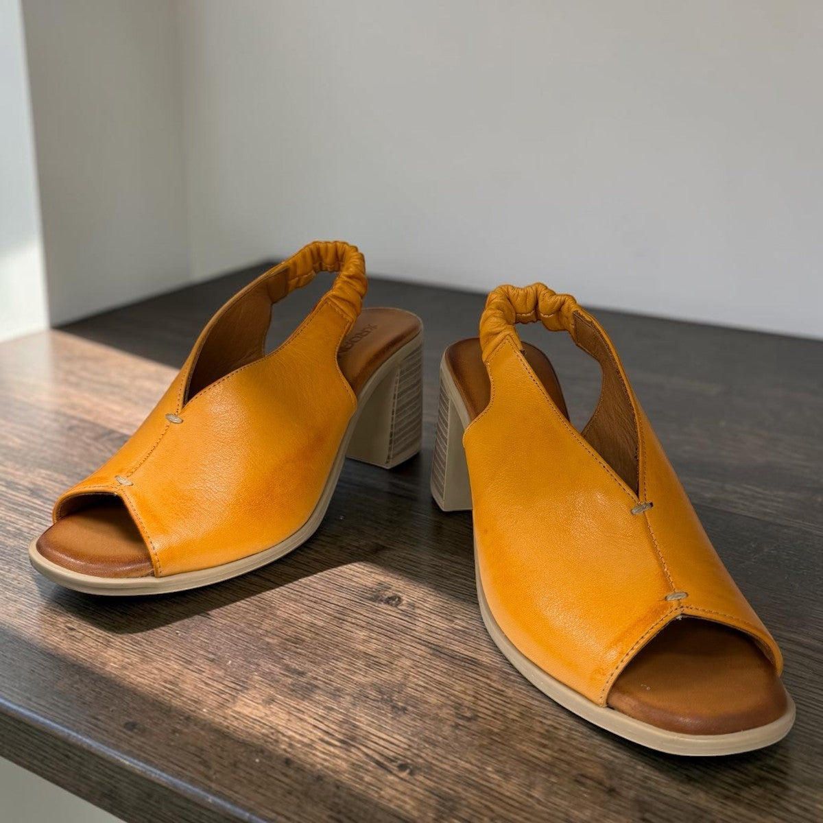Roamers Qiana orange leather slingback sandals with a 3-inch block heel and elasticated back strap
photo of the front