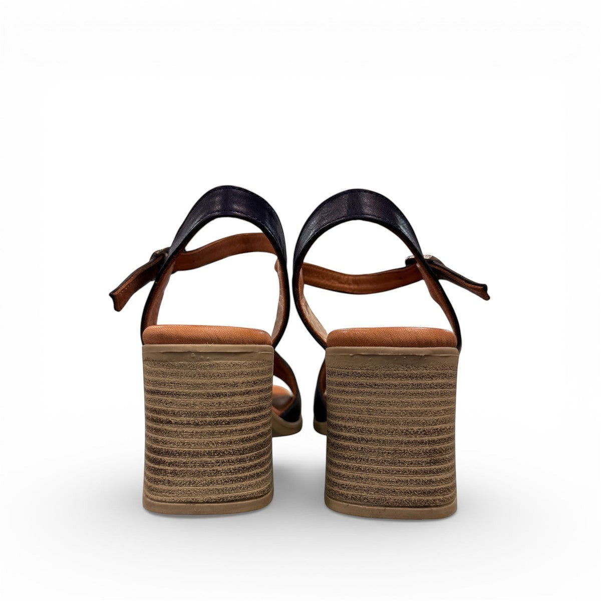 Roamers Quana navy leather heeled sandals with an adjustable instep strap and 2.5-inch block heel.
photo of the back side