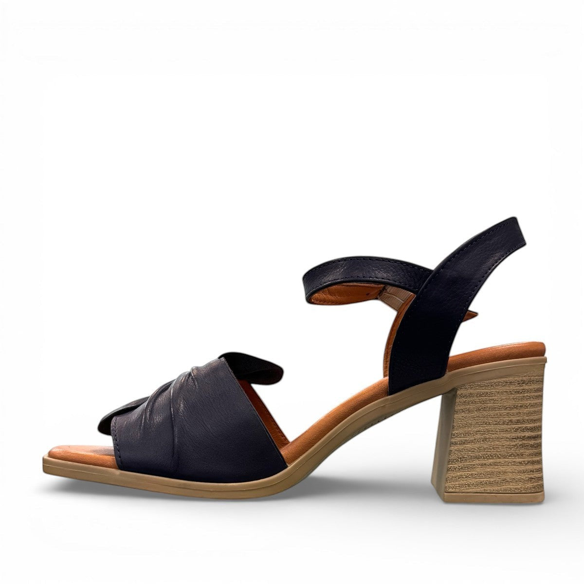 Roamers Quana navy leather heeled sandals with an adjustable instep strap and 2.5-inch block heel.
photo of the left side