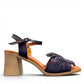Roamers Quana navy leather heeled sandals with an adjustable instep strap and 2.5-inch block heel.
photo of the right side