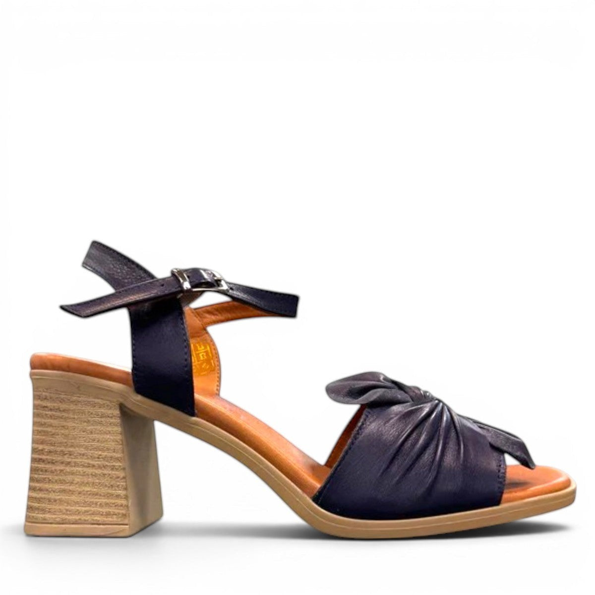 Roamers Quana navy leather heeled sandals with an adjustable instep strap and 2.5-inch block heel.
photo of the right side