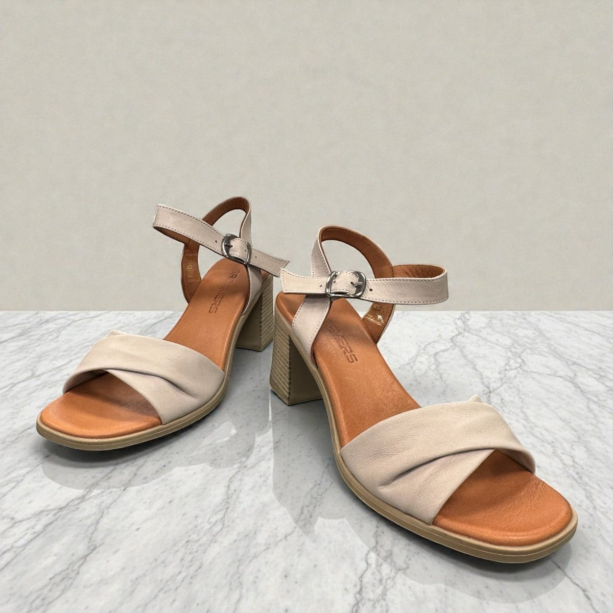 Roamers Quilla silver gray leather heeled sandals with an adjustable instep strap and block heel.
photo of the front side