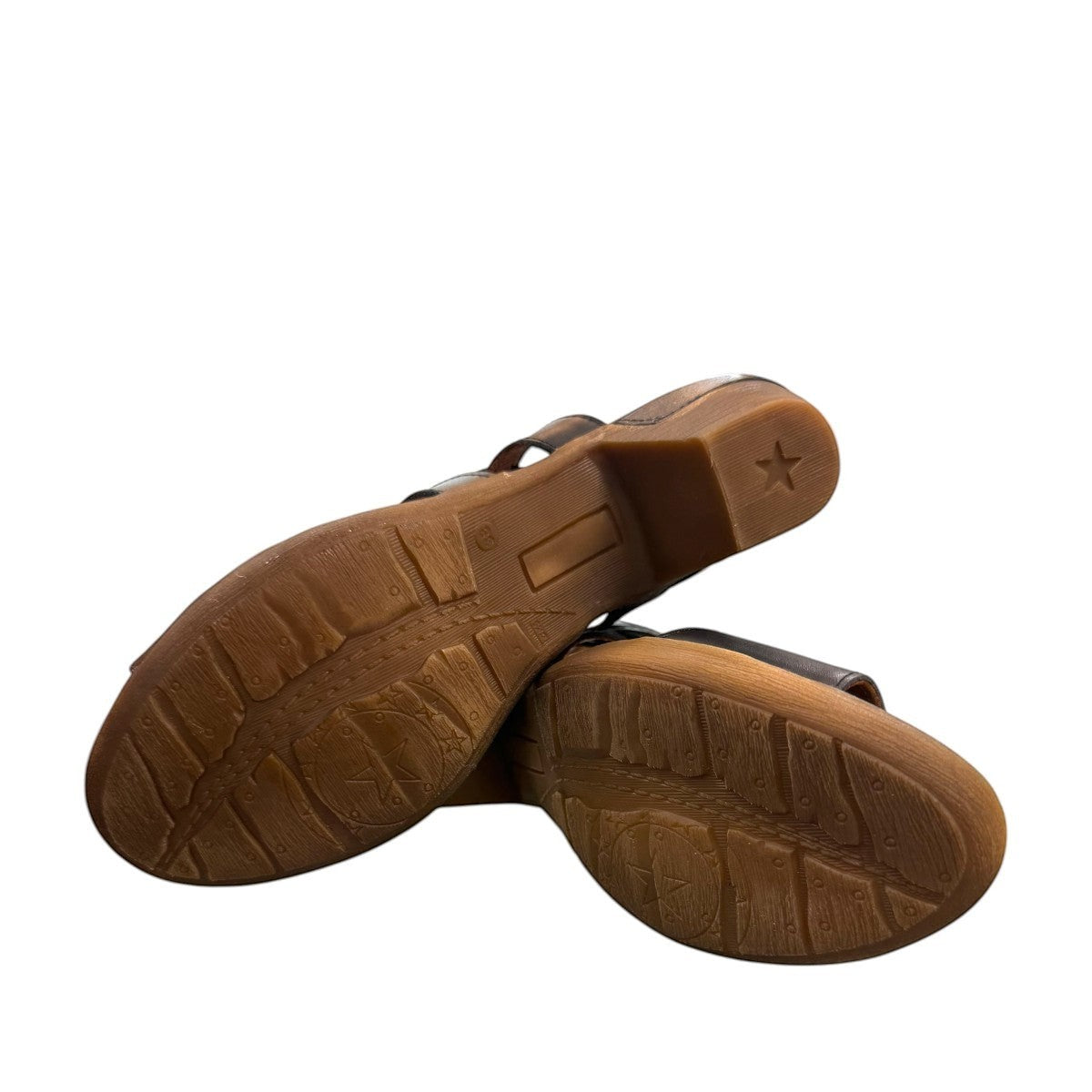 roamers Remi black leather heeled sandals with an adjustable back strap and comfortable rubber outsole.
photo of the bottom side
