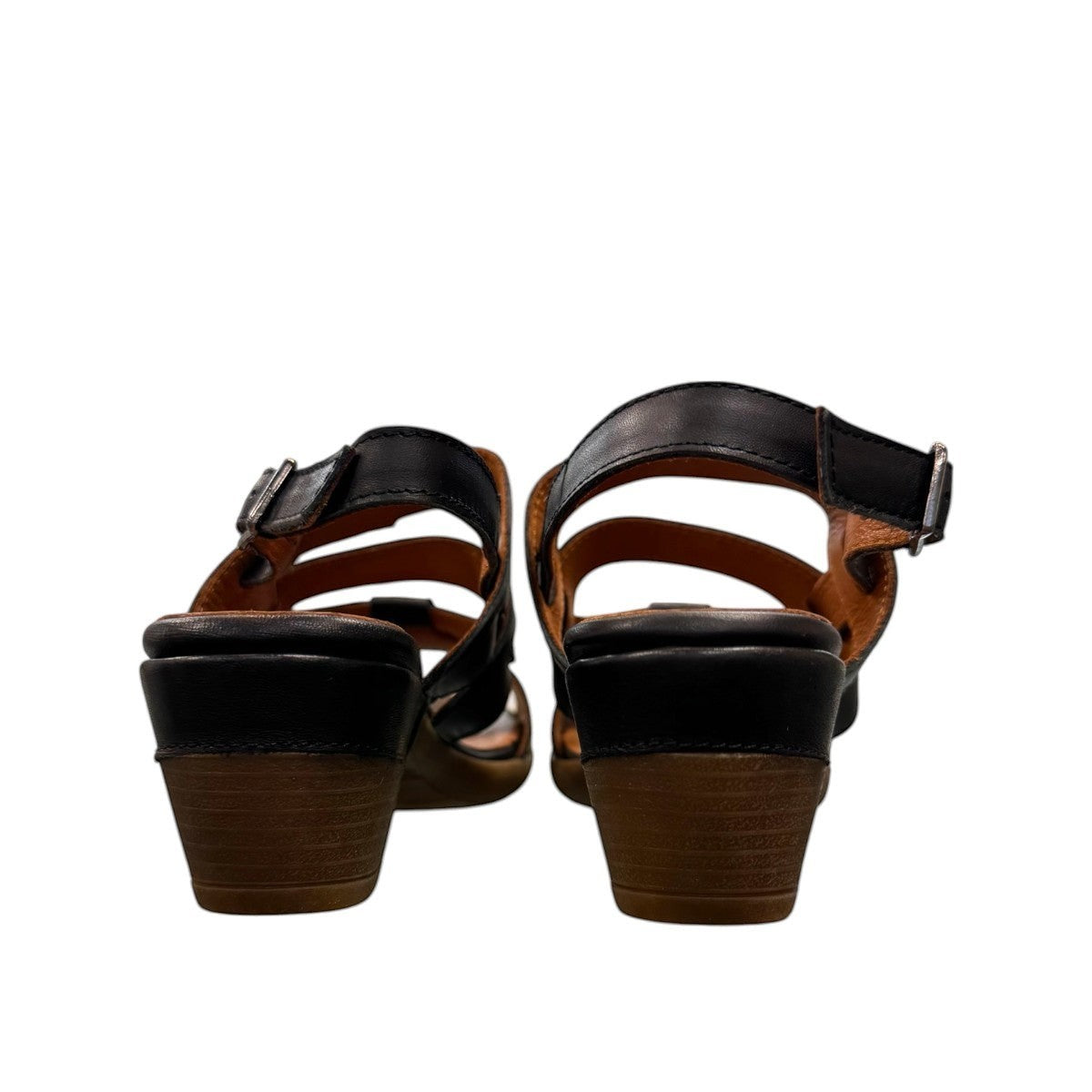roamers Remi black leather heeled sandals with an adjustable back strap and comfortable rubber outsole.
photo of the back side