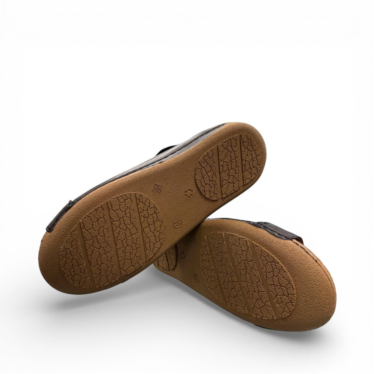 Roamers Talani black leather sandals with a velcro instep strap and comfortable rubber outsole.
photo of the  bottom side