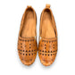 roamers tan leather slip-on loafer with geometric laser cutouts, artisan stitching, and flexible rubber outsole.
photo of the top side