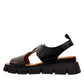 Roamers Ulyana 01 black leather platform sandal with adjustable straps and tan insole.
photo of the left side