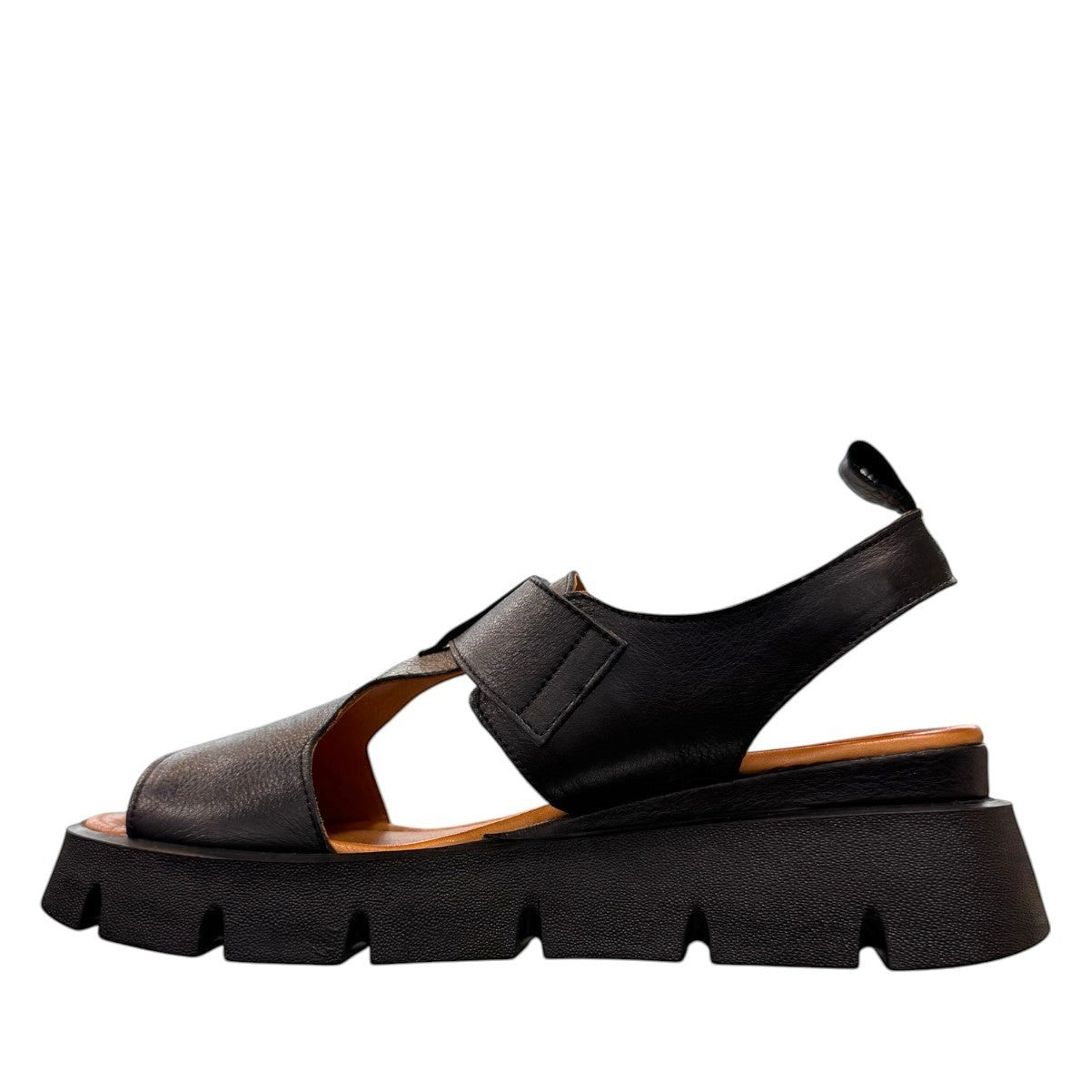 Roamers Ulyana 01 black leather platform sandal with adjustable straps and tan insole.
photo of the left side
