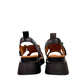 Roamers Ulyana 01 black leather platform sandal with adjustable straps and tan insole.
photo of the back side
