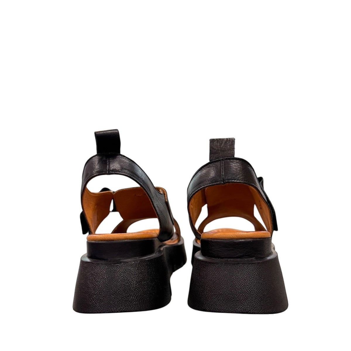 Roamers Ulyana 01 black leather platform sandal with adjustable straps and tan insole.
photo of the back side