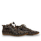 Roamers Venus black leather ankle boots with decorative floral cutouts, elastic lacing, and flat sole.
photo of the side