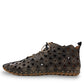 Roamers Venus black leather ankle boots with decorative floral cutouts, elastic lacing, and flat sole.
photo of the left side