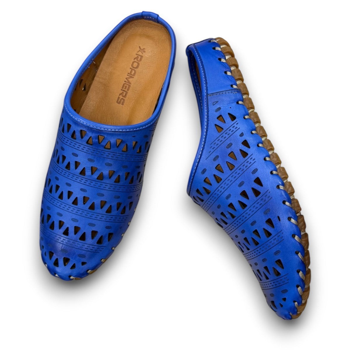 Roamers Verity sax blue leather slip-on sandal with breathable perforated cutouts and a rubber outsole.
photo of the top side