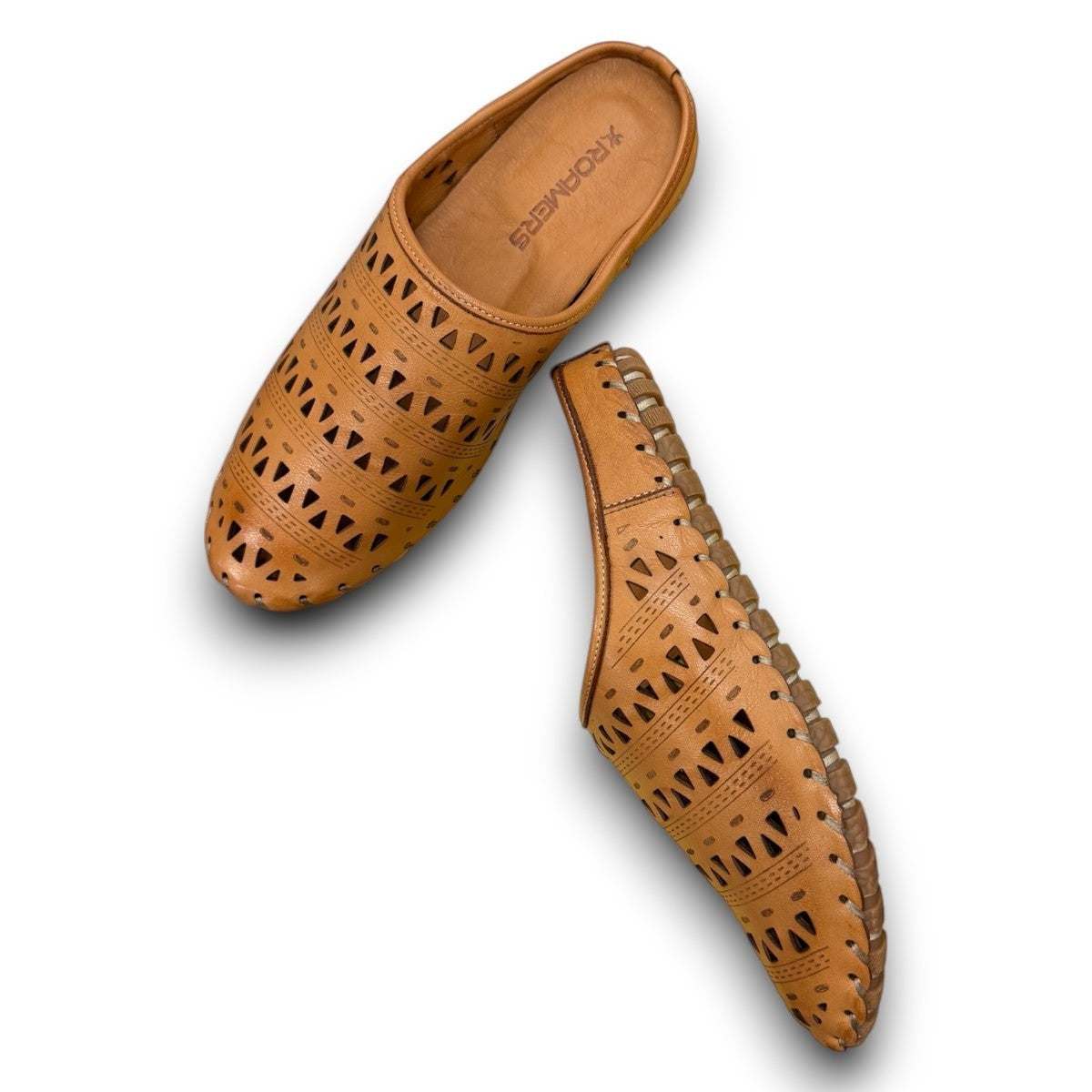 tan leather backless slip-on sandal with breathable perforated cutouts and a durable rubber outsole.
photo of the top side