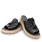 Roamers Veronica black leather slip-on wedge sandal with a knotted detail and platform sole.
photo of the front side