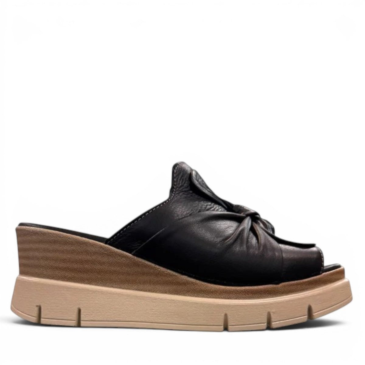 Roamers Veronica black leather slip-on wedge sandal with a knotted detail and platform sole.
photo of the right side