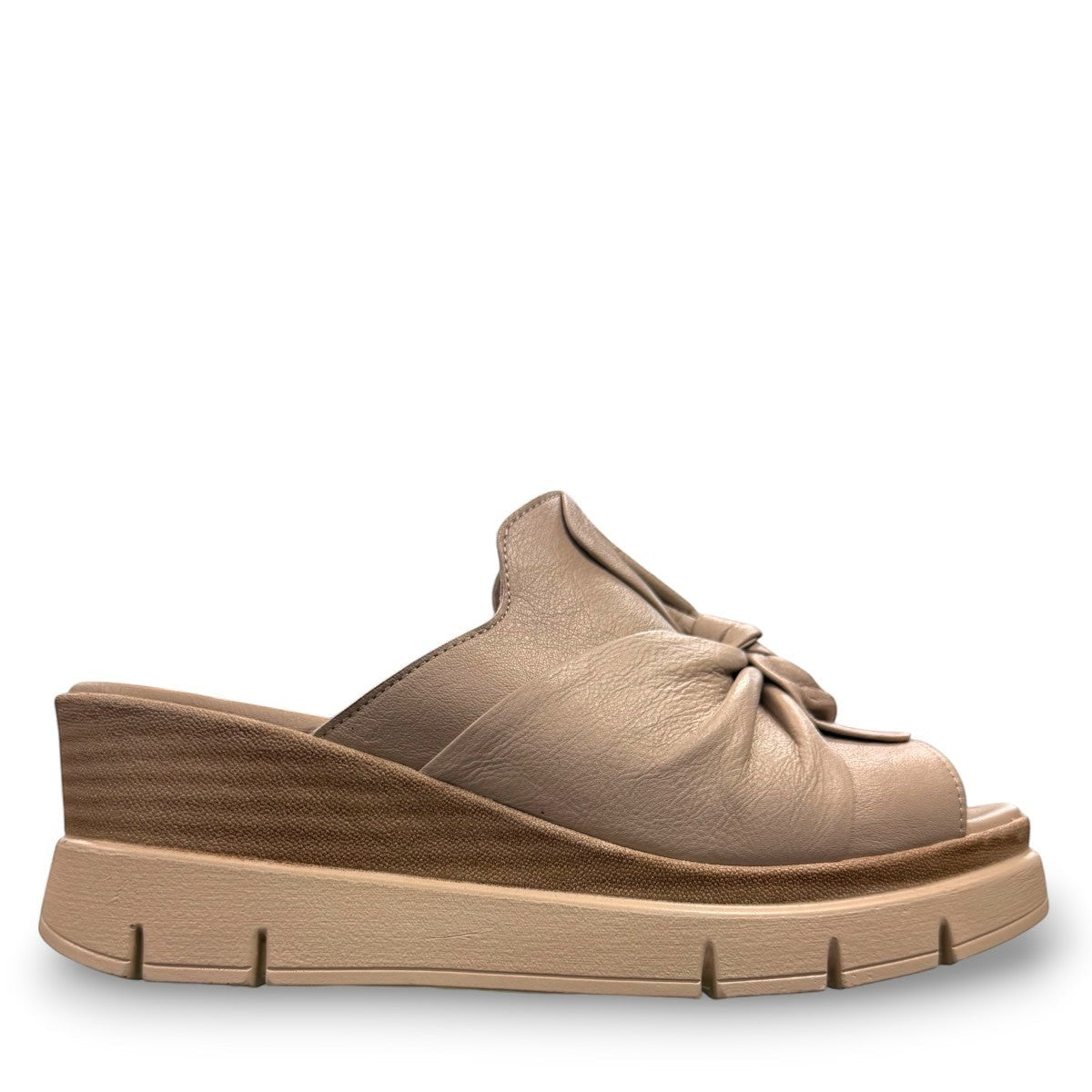 Roamers Veronica silver grey leather wedge mules with a knotted front detail and platform sole.
photo of the right side