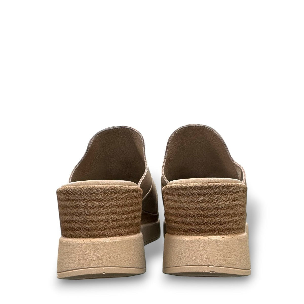 Roamers Veronica silver grey leather wedge mules with a knotted front detail and platform sole.
photo of the back side