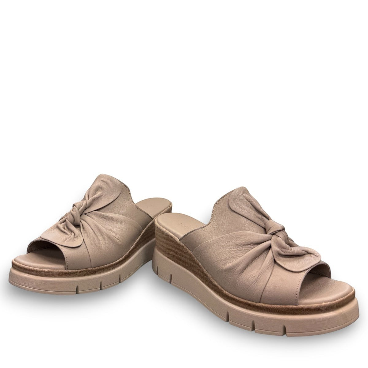 Roamers Veronica silver grey leather wedge mules with a knotted front detail and platform sole.
photo of the front