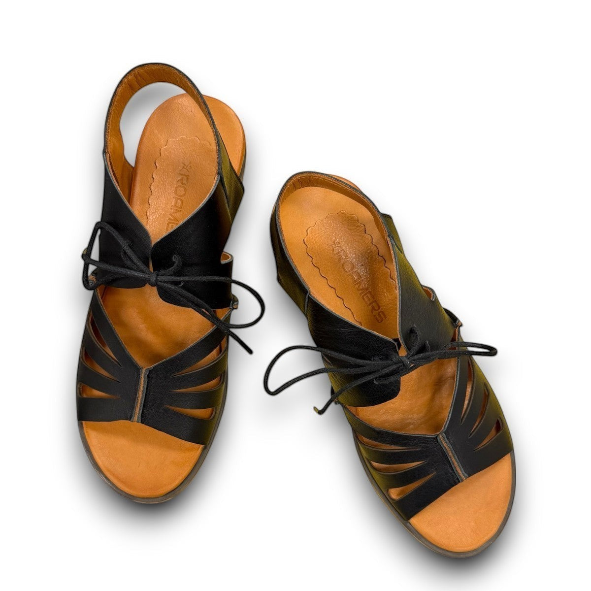Roamers Vienna black leather lace-up sandals with cut-out design and tan footbed
photo of the top