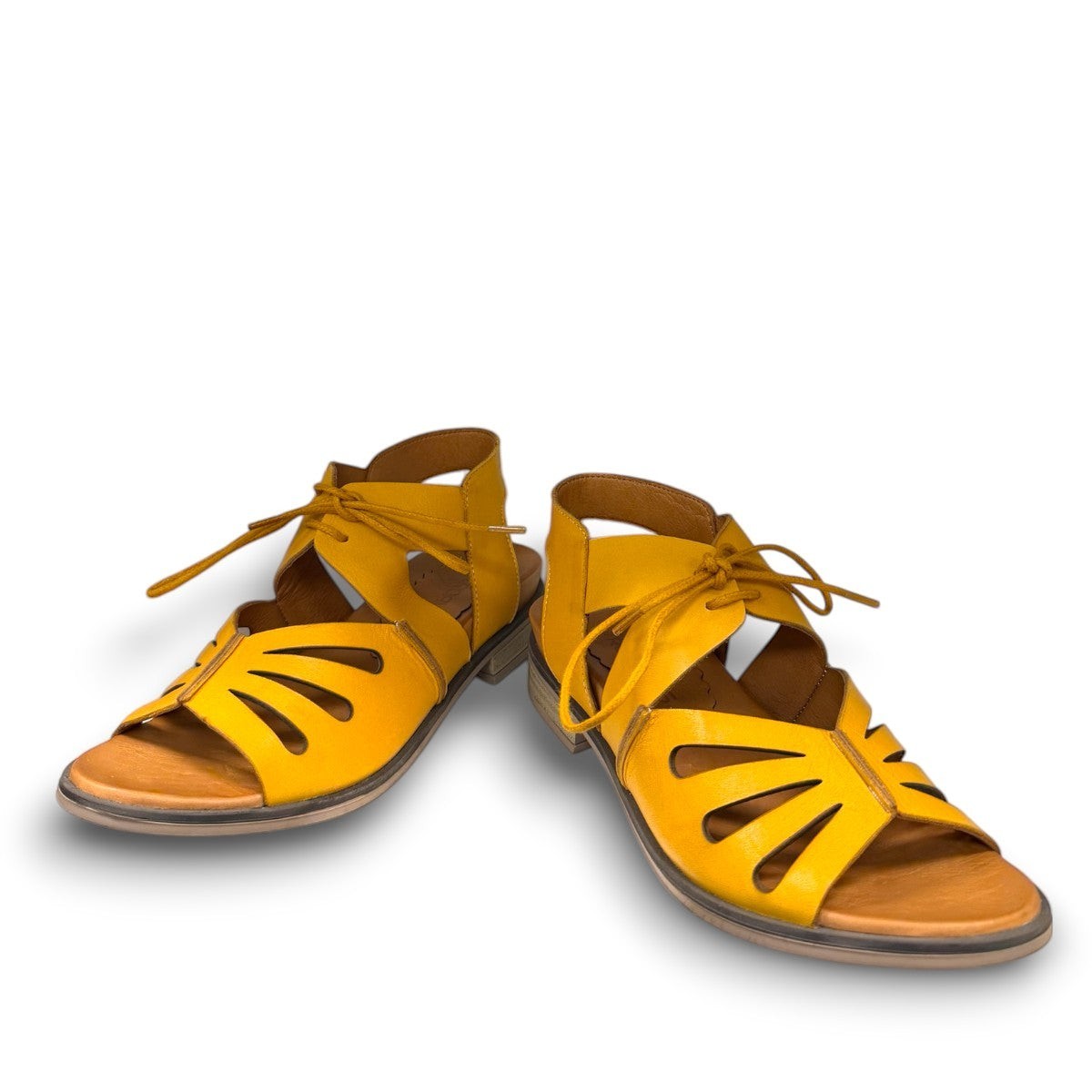 Roamers Vienna yellow leather sandals with lace-up closure, cut-out toe detail, and low block heel.
photo of the front side