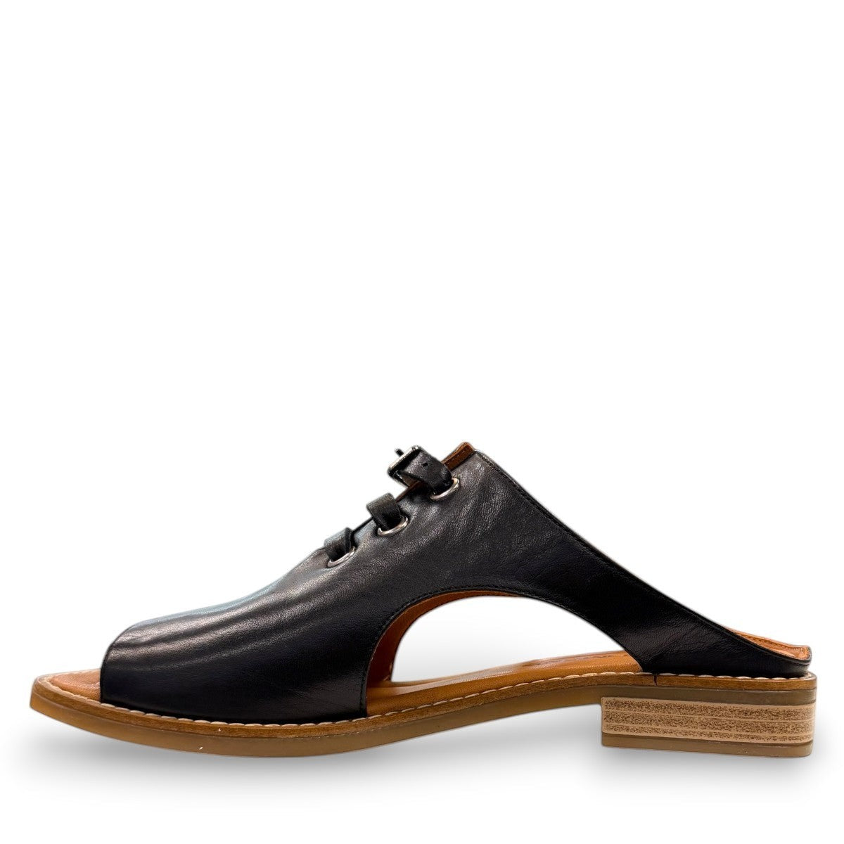Roamers Whitney black leather backless sandal with lace-up detail and low rubber heel.
photo of the left side