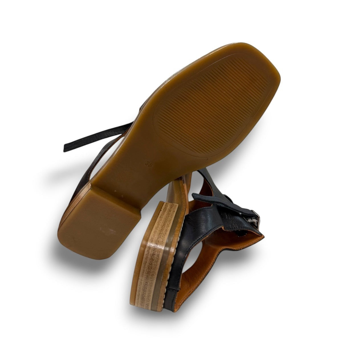 Roamers Whitney black leather backless sandal with lace-up detail and low rubber heel.
photo of the bottom side