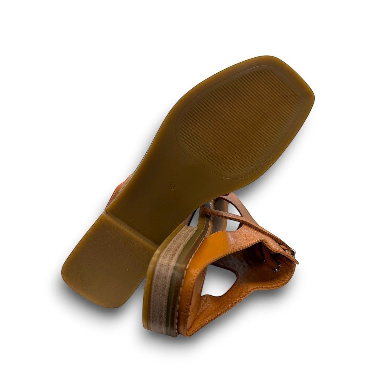 Roamers Whitney coconut leather backless sandals showing the textured rubber outsole and low heel.
photo of the bottom side