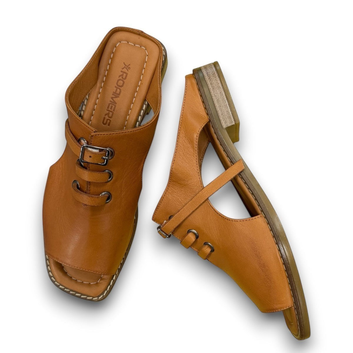 Roamers Whitney backless leather sandals in coconut brown with slip-on design and lace-up detail.
photo of the top side