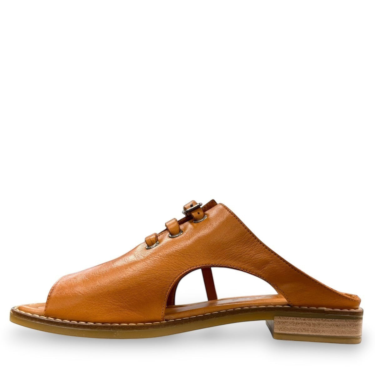 Roamers Whitney backless leather sandals in coconut brown with slip-on design and lace-up detail.
photo of the left side