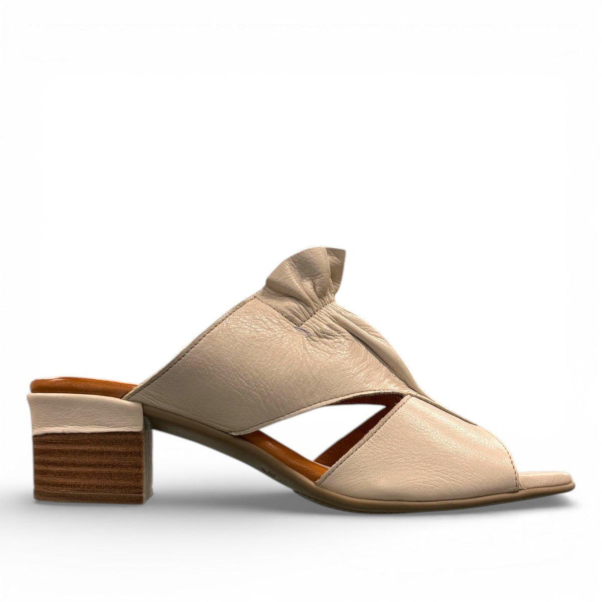 Roamers Zola slides in egret cream leather with a low block heel and gathered front detail.
photo of the right side