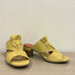 Roamers Zola pistachio green leather slide sandals with a low block heel and gathered strap detail.
photo of the front side