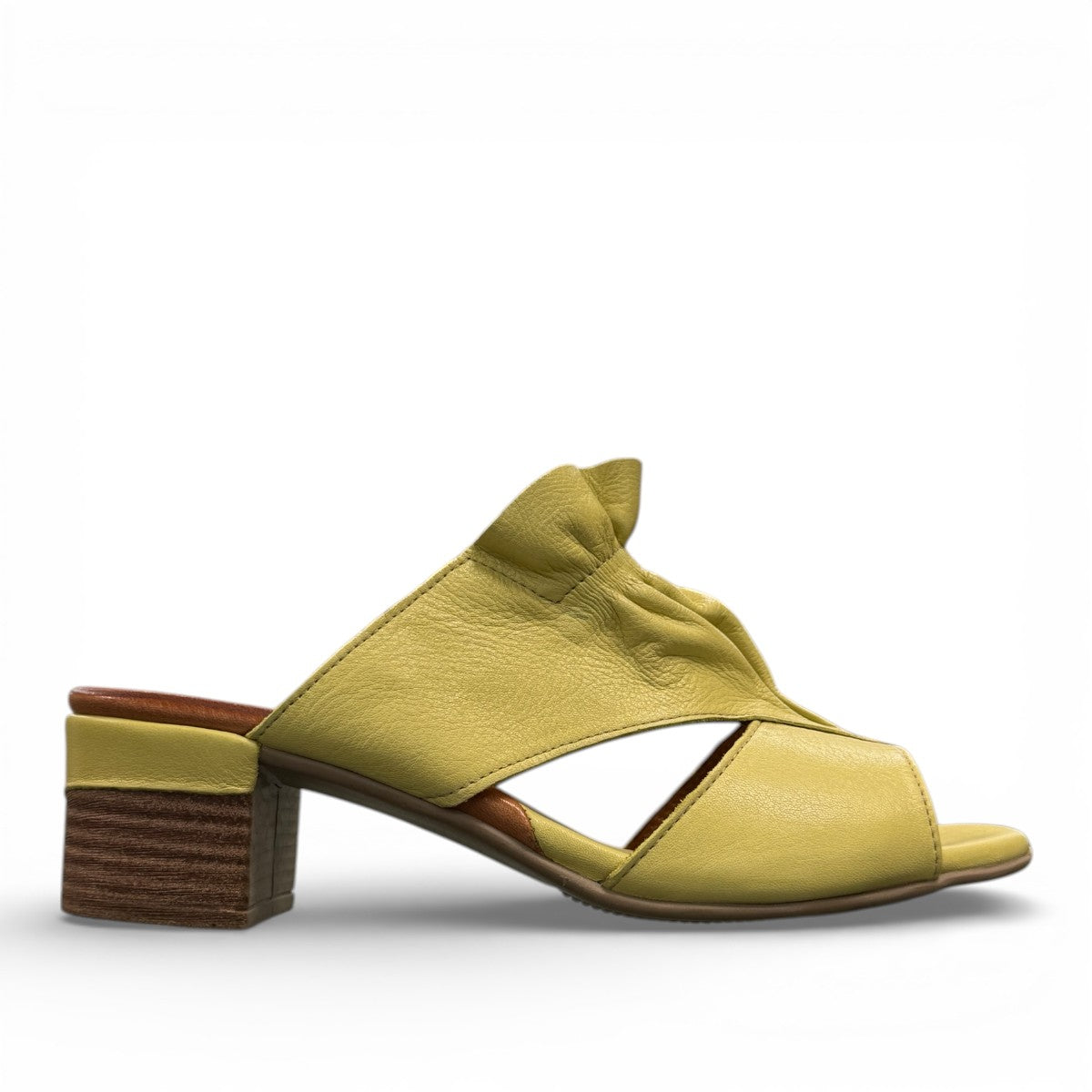 Roamers Zola pistachio green leather slide sandals with a low block heel and gathered strap detail.
photo of the right side