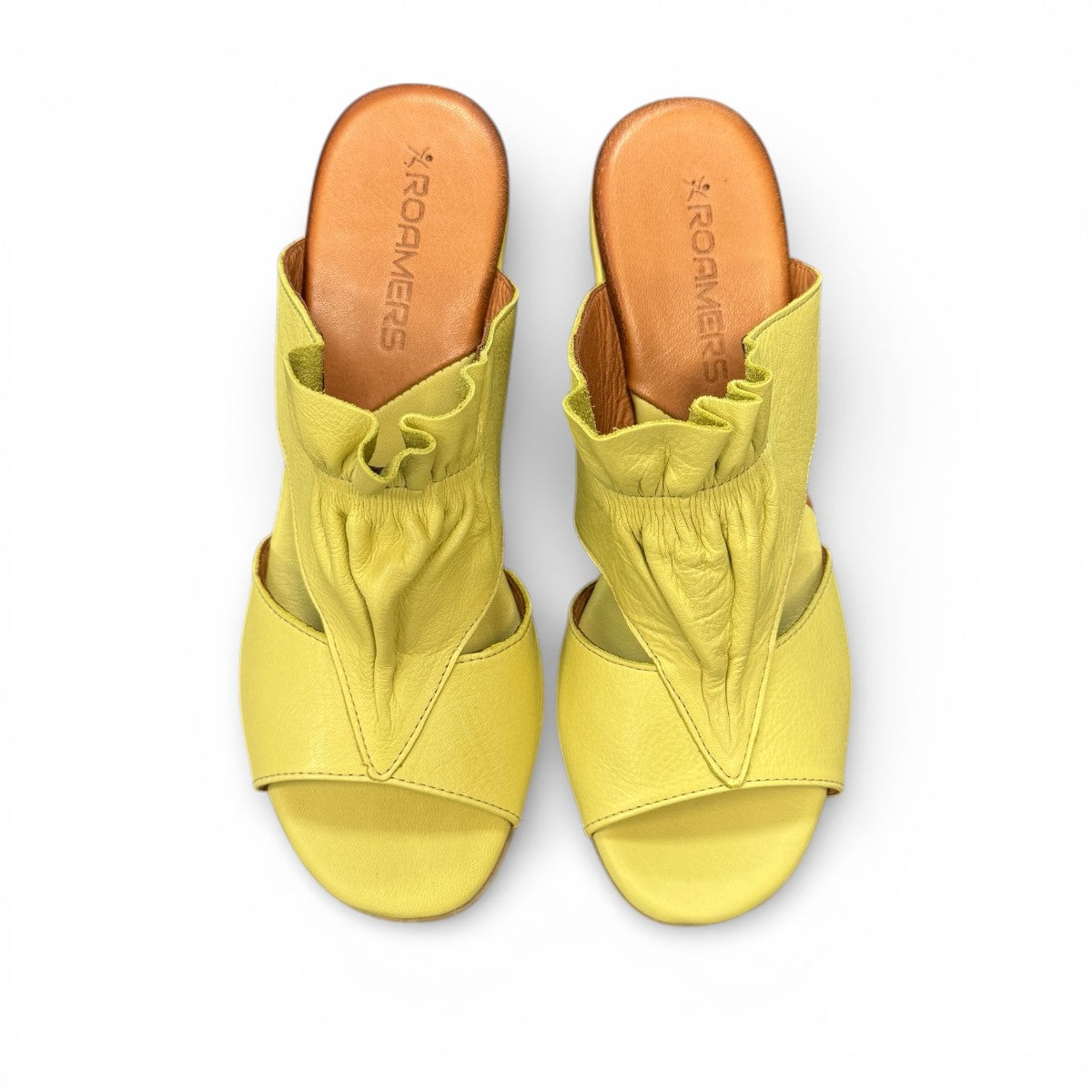 Roamers Zola pistachio green leather slide sandals with a low block heel and gathered strap detail.
photo of the top side