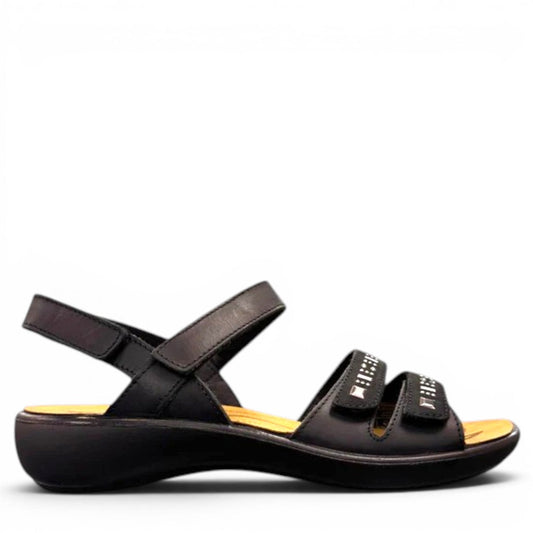 Romika Ibiza black leather sandal with four adjustable hook and loop straps and flexible outsole.
photo of the right side