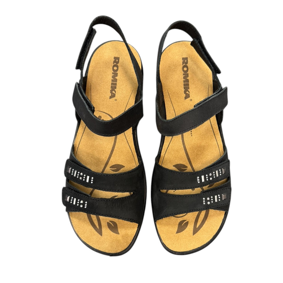 Romika Ibiza black leather sandal with four adjustable hook and loop straps and flexible outsole.
photo of the top side