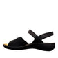 Romika Ibiza black leather sandal with four adjustable hook and loop straps and flexible outsole.
photo of the left side