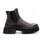 Romika Ruby 01 black vegan leather Chelsea boot with a chunky platform lug sole and elastic side panels.
photo of the right side