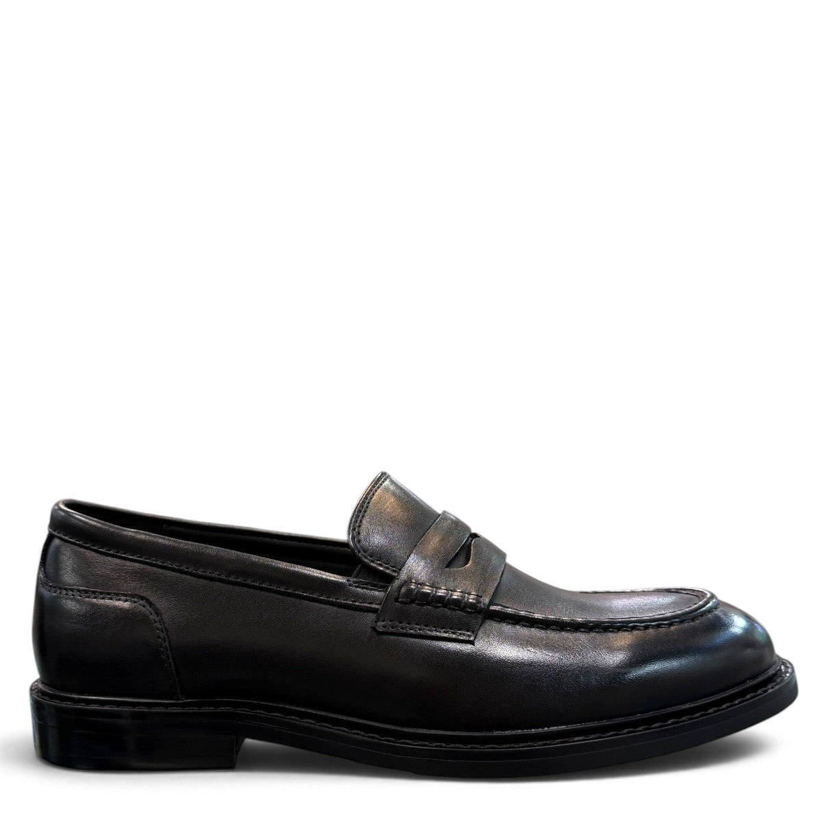 Romitan Tondar black leather slip-on dress shoes with a classic penny loafer design. Photo of right side view.