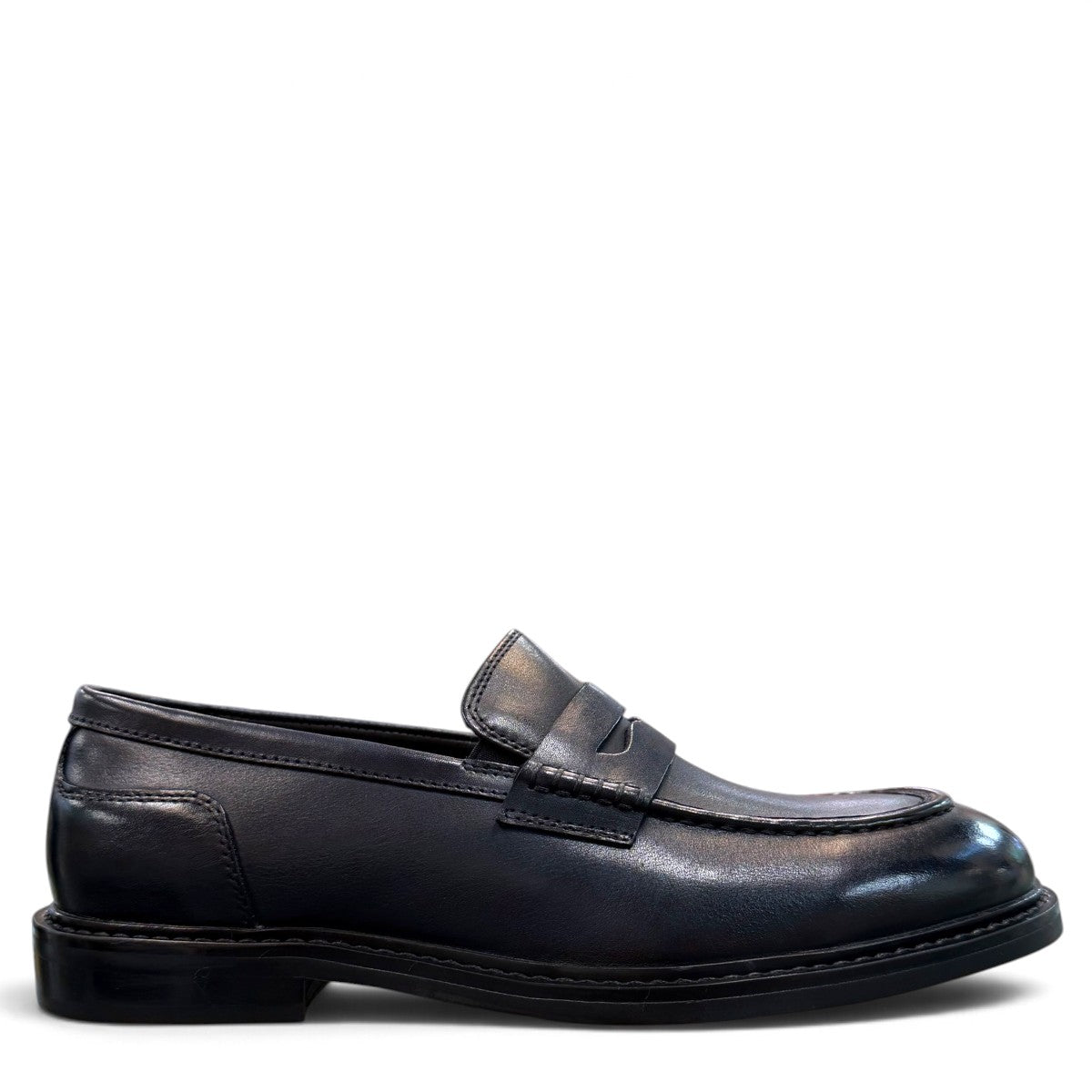Romitan Tondar navy leather slip-on dress shoes with a classic penny loafer design. Photo of right side view.