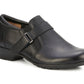 Ros Hommerson Eliot black tumbled leather loafer with adjustable hook and loop strap and low block heel.
photo of the front side