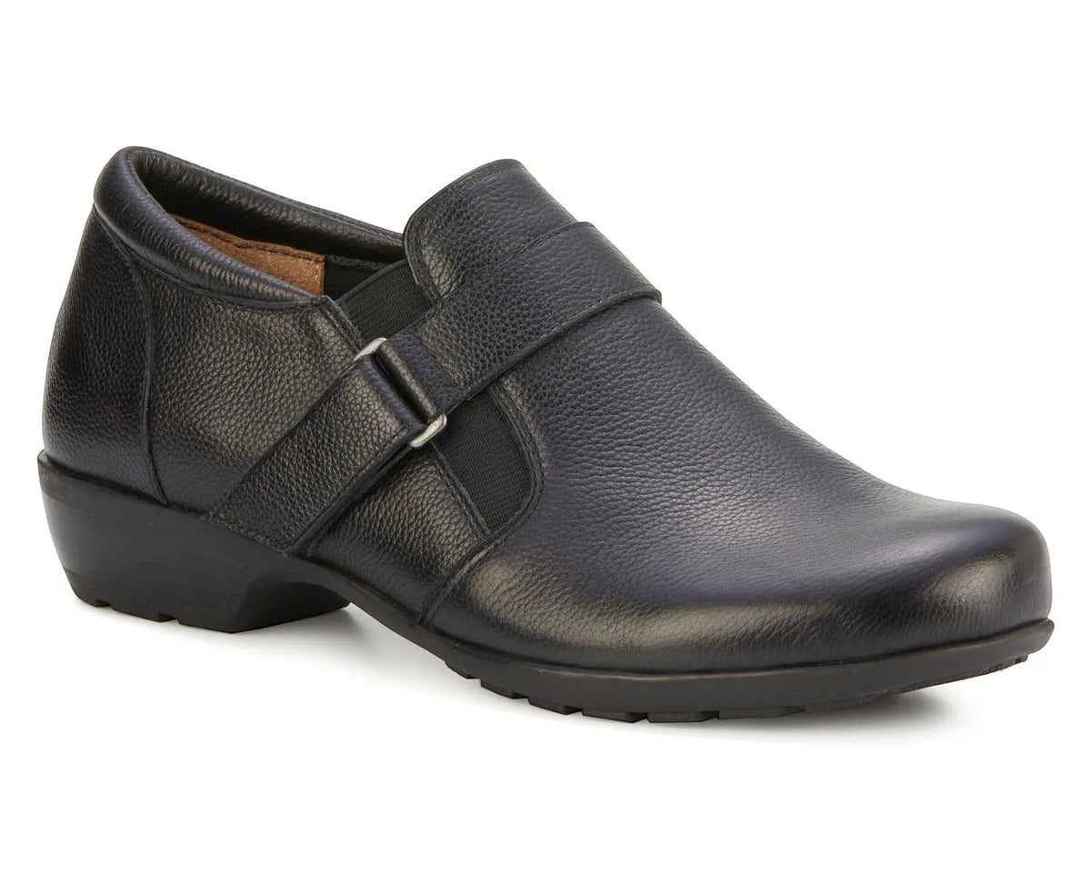 Ros Hommerson Eliot black tumbled leather loafer with adjustable hook and loop strap and low block heel.
photo of the front side