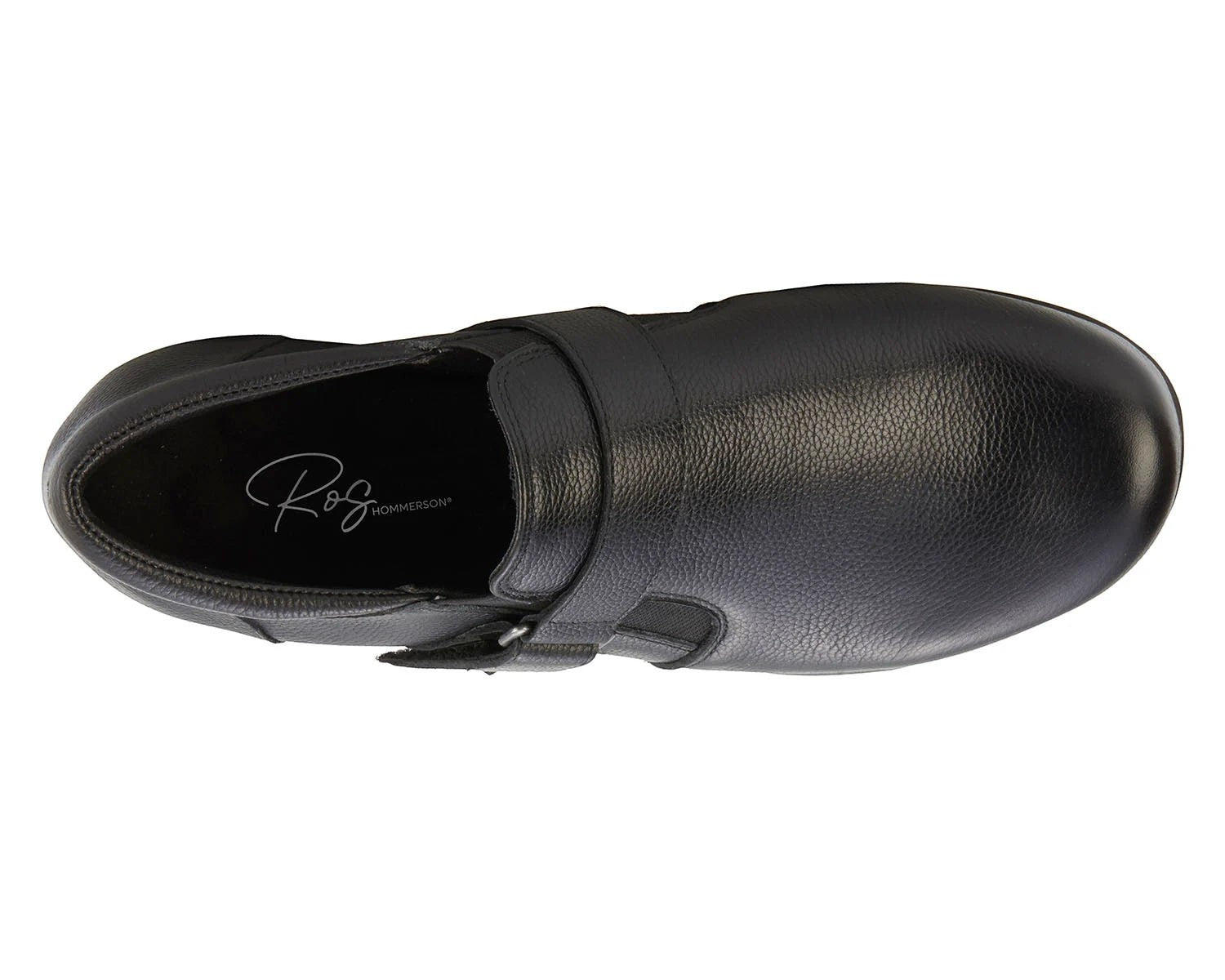 Ros Hommerson Eliot black tumbled leather loafer with adjustable hook and loop strap and low block heel.
photo of the top side