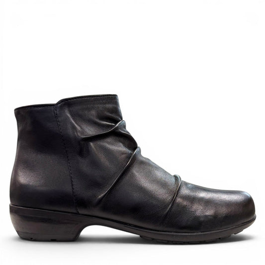 Ros Hommerson Esme black leather ankle bootie with ruched vamp detailing and a low stacked heel.
photo of the right side