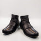Ros Hommerson Esme black leather ankle bootie with ruched vamp detailing and a low stacked heel.
photo of the front side