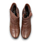 Ros Hommerson Esme brown leather ankle bootie with ruched vamp detailing and a low stacked heel.
photo of the top side